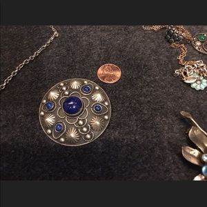 Silver antique round pin brooch.